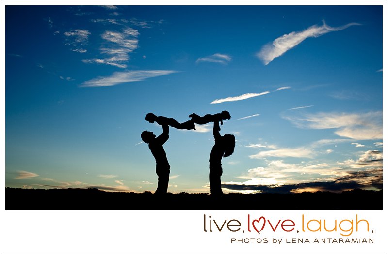 family is posting for a photo session at Indian Trail country club